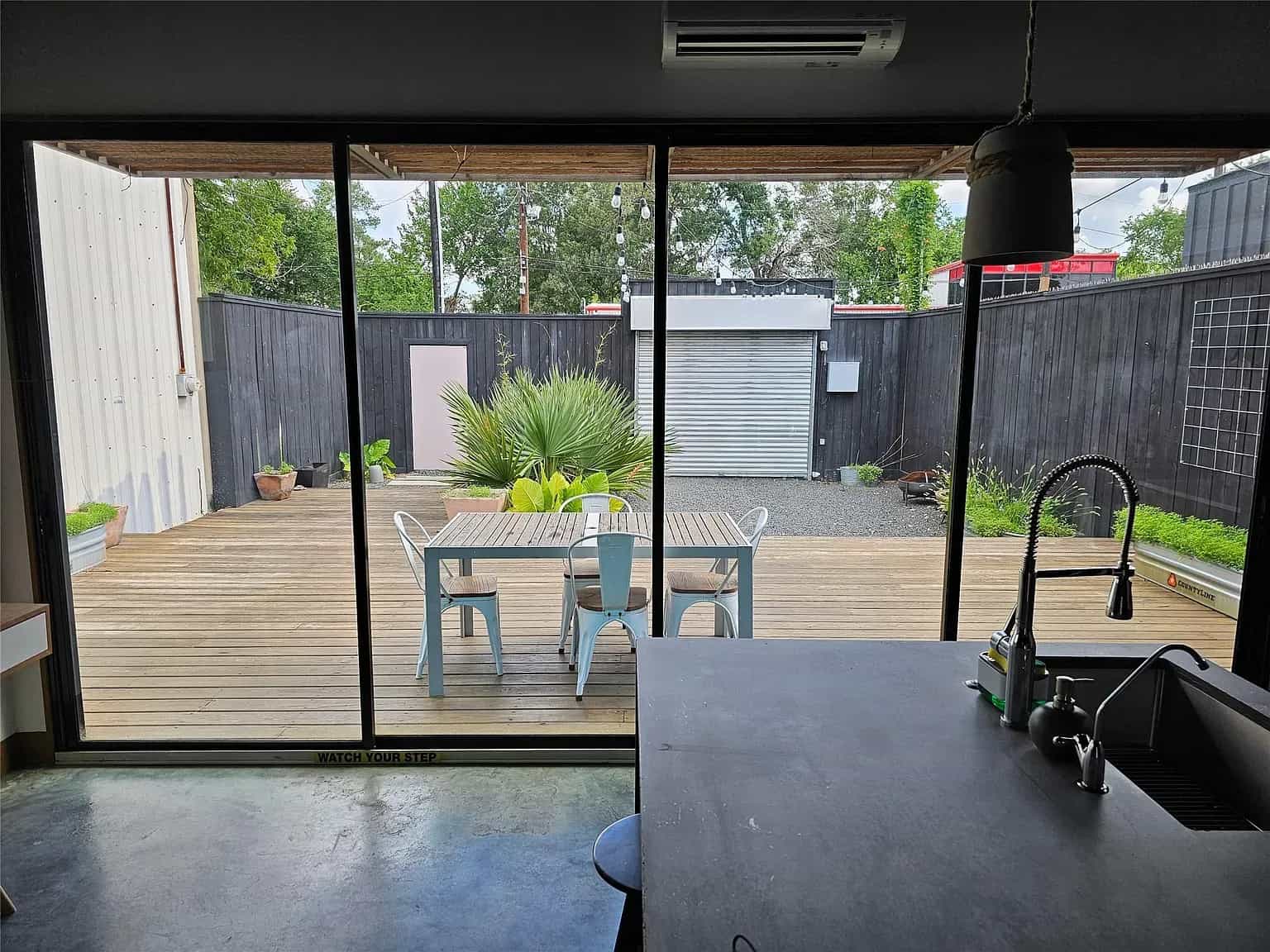 https://mogul-property-details-prod.s3.amazonaws.com/images/Kitchen%20to%20Deck-1725573812915.webp